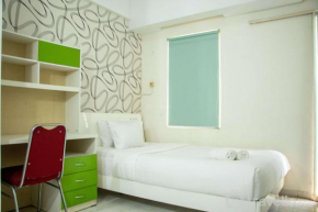Homey and Cozy Stay Studio at Margonda Residence 2 Apartment By Travelio
